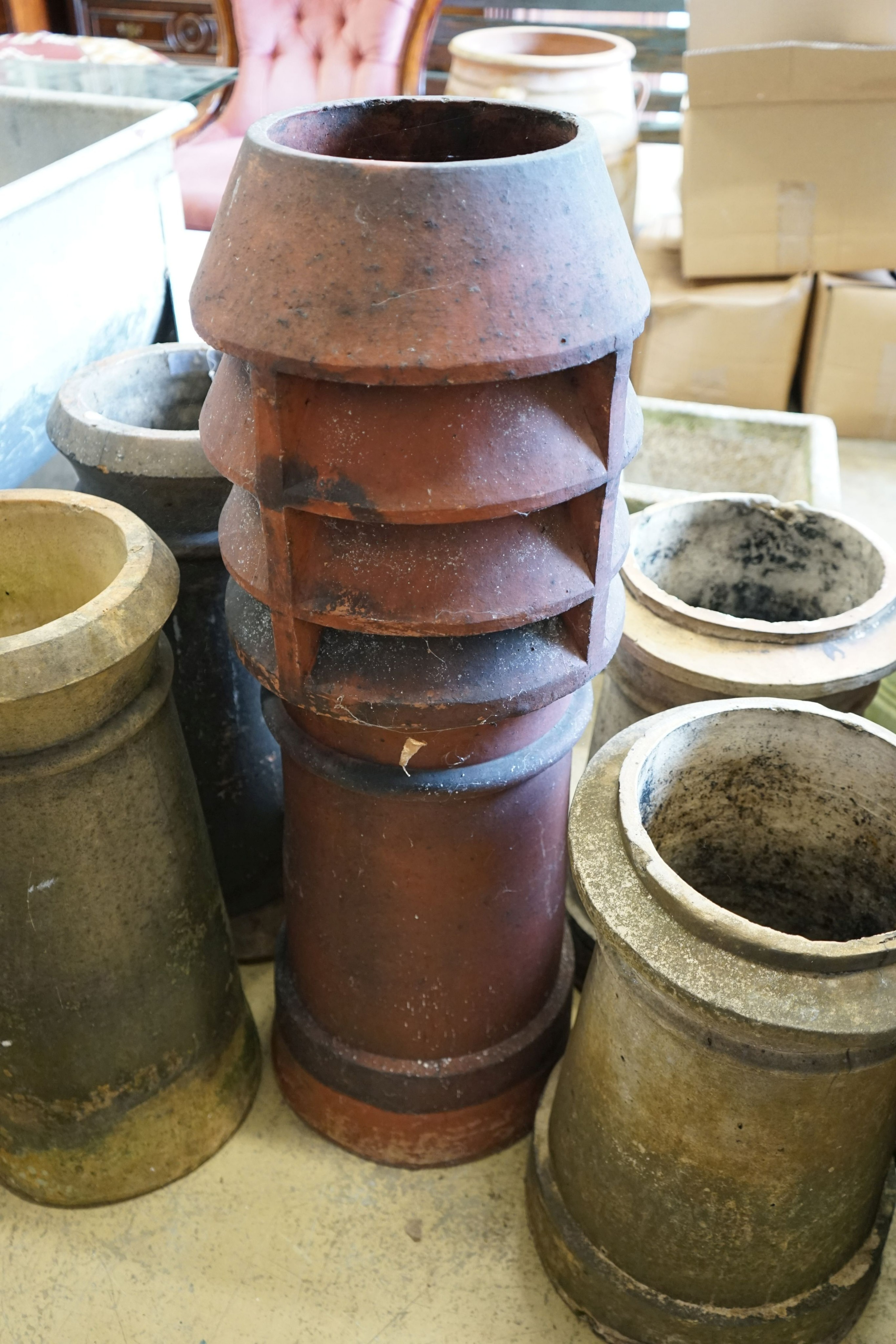 Five earthenware pottery chimney pots, largest height 92cm